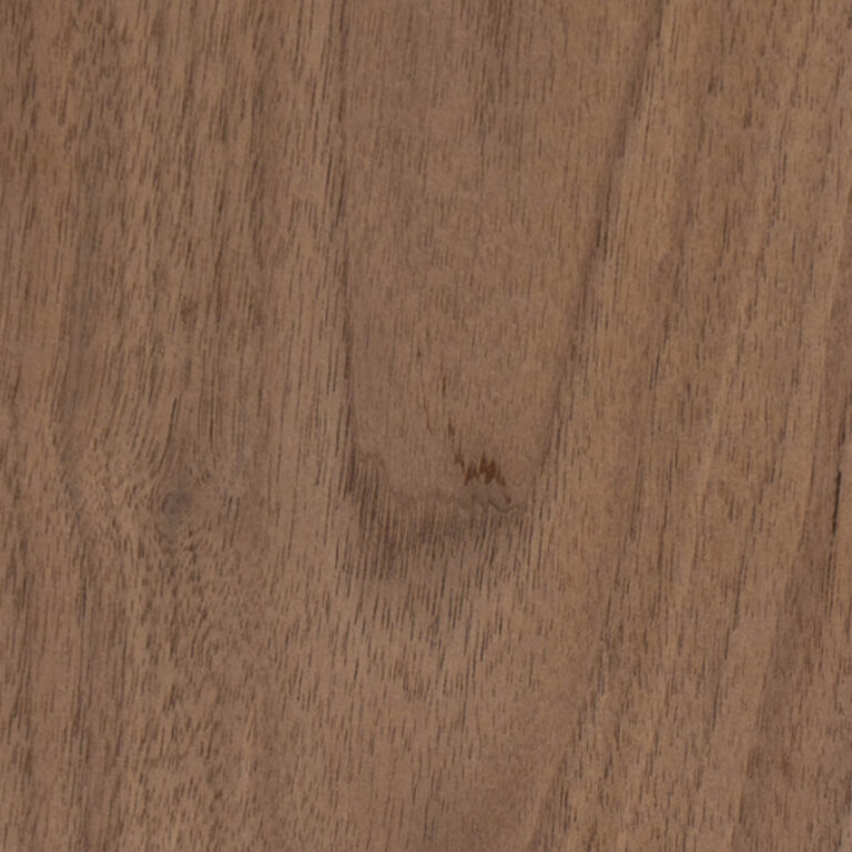 Close-up of warm brown wood grain with subtle vertical streaks and a small knot.