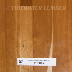 Cherry Flooring. Smooth reddish-brown cherry wood planks with subtle grain variations, a faint "TIDEWATER LUMBER" watermark across the top and a small white label at the bottom reading CHERRY.