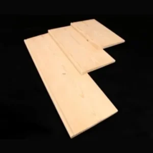 Colonial Siding. Four light-colored wooden tongue-and-groove floorboards staggered in an overlapping arrangement on a black background.